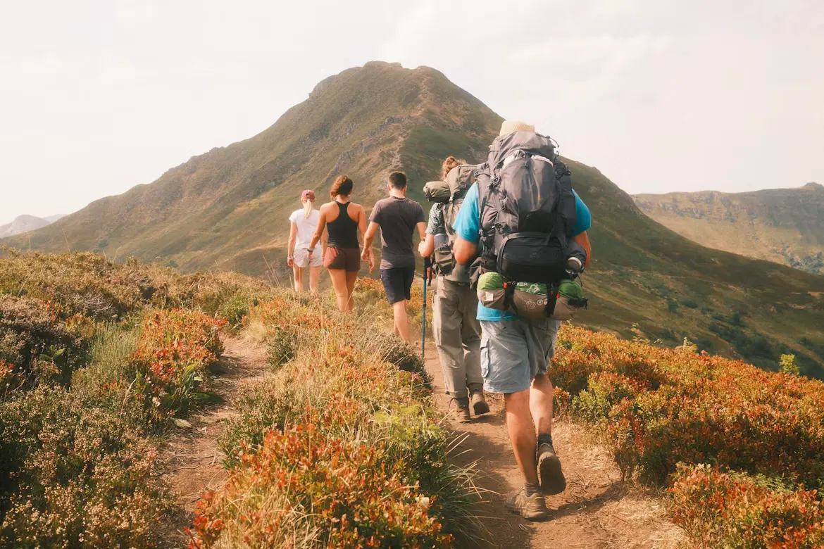 Small Group Hikers on Mountain Trail